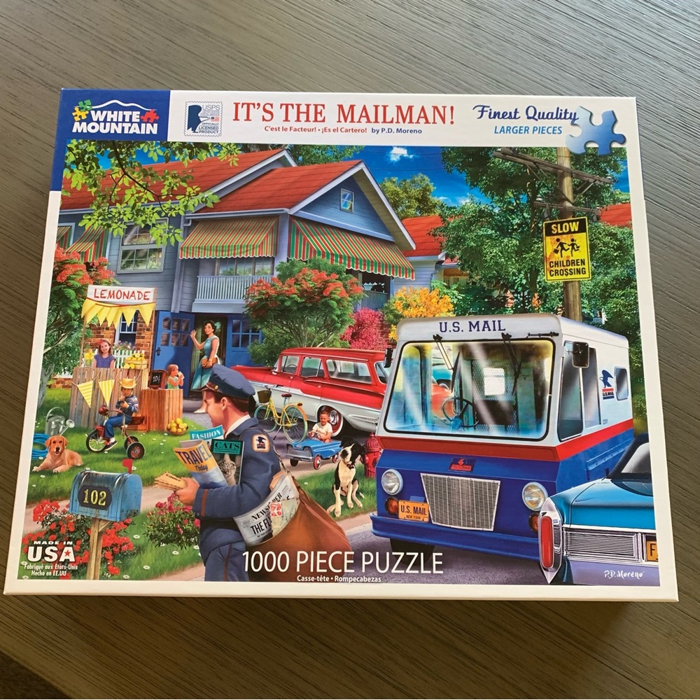 It’s the mailman white Mountain 1,000 piece puzzle
